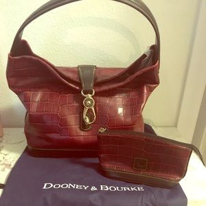 Dooney and Bourke red hand bag